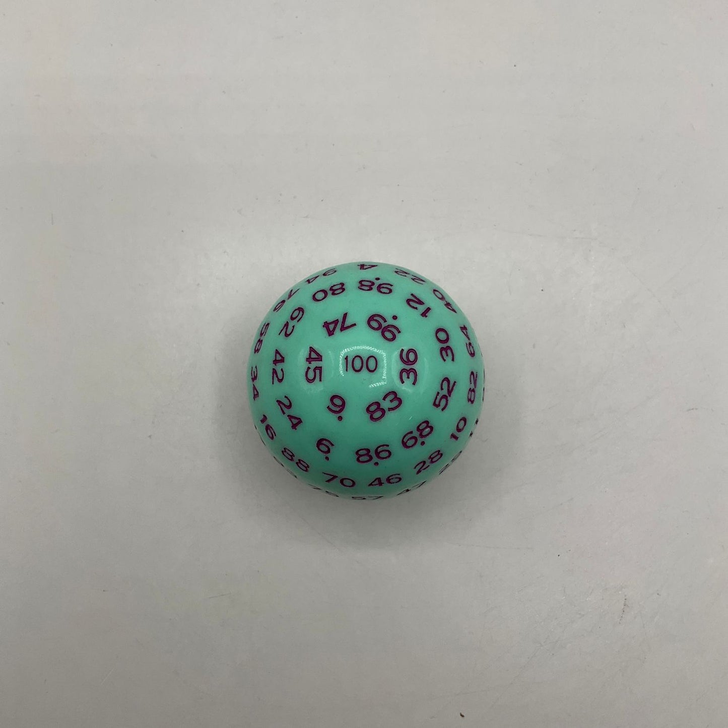 Critical Hit Collectibles: Single Mint Green D100 Opaque Polyhedral Die with Purple Numbers for RPGS