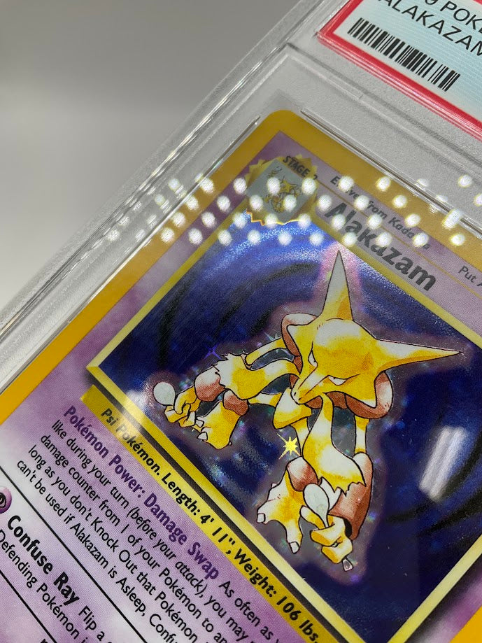 Alakazam Pokemon Base Set Holo #1 PSA 8