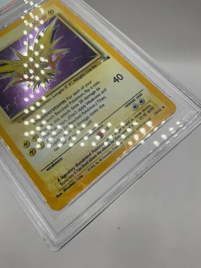 Zapdos Pokemon Fossil Holo #15 PSA 8