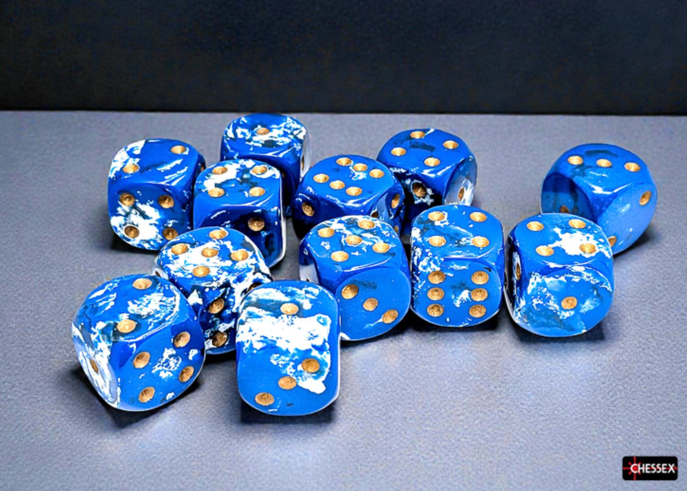 Chessex: Wavebreak/Gold 16mm d6 Dice Block (12 Dice)