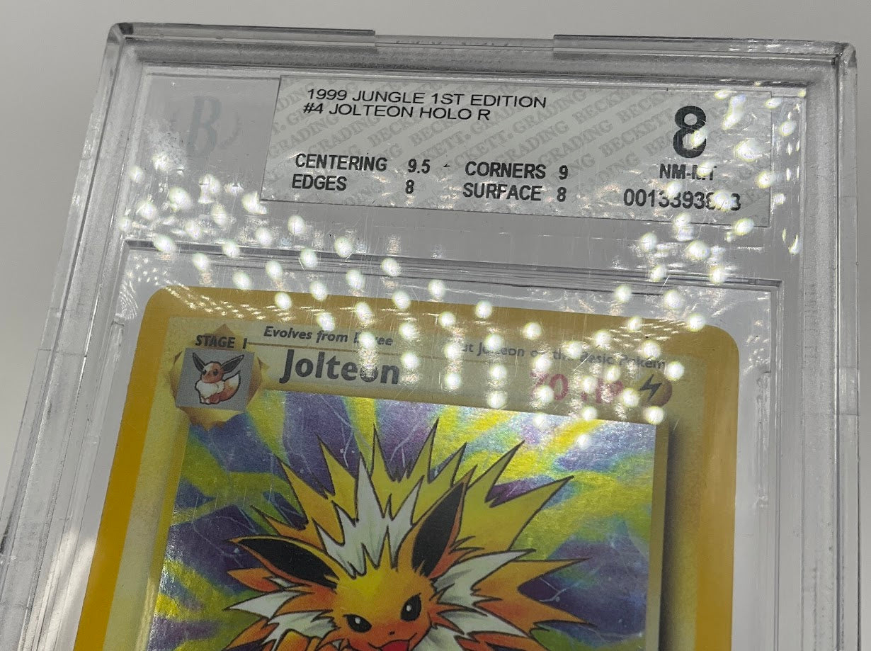 Jolteon Pokemon Jungle Holo 1st Edition #4 Beckett 8