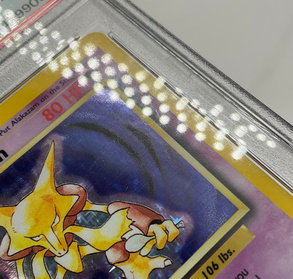 Alakazam Pokemon Base Set Holo #1 PSA 8