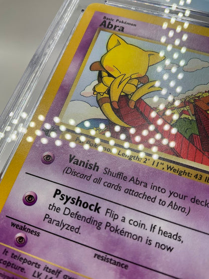 Abra Pokemon Team Rocket 1st Edition #49 CGC 9