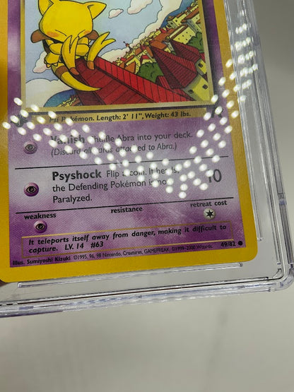 Abra Pokemon Team Rocket 1st Edition #49 CGC 9