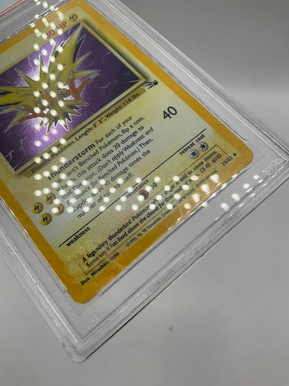 Zapdos Pokemon Fossil Holo #15 PSA 8