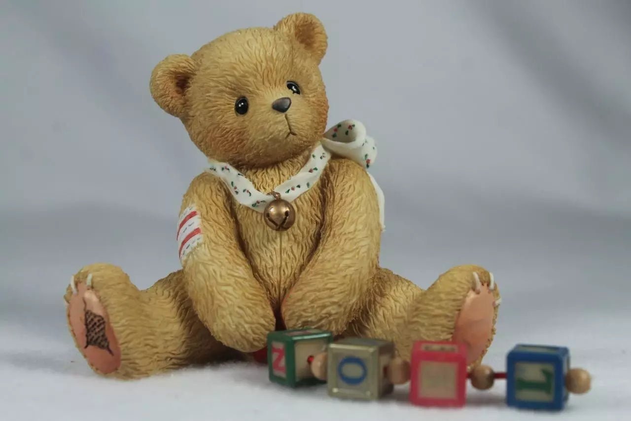 Cherished Teddies: Nolan "A String Of Good Tidings" Figurine - Collector Store LLC